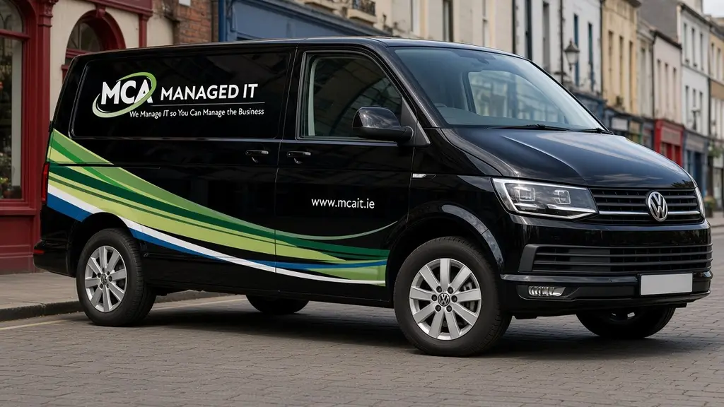 Our vans: a black MCA Managed IT Volkswagen Transporter in MCA livery